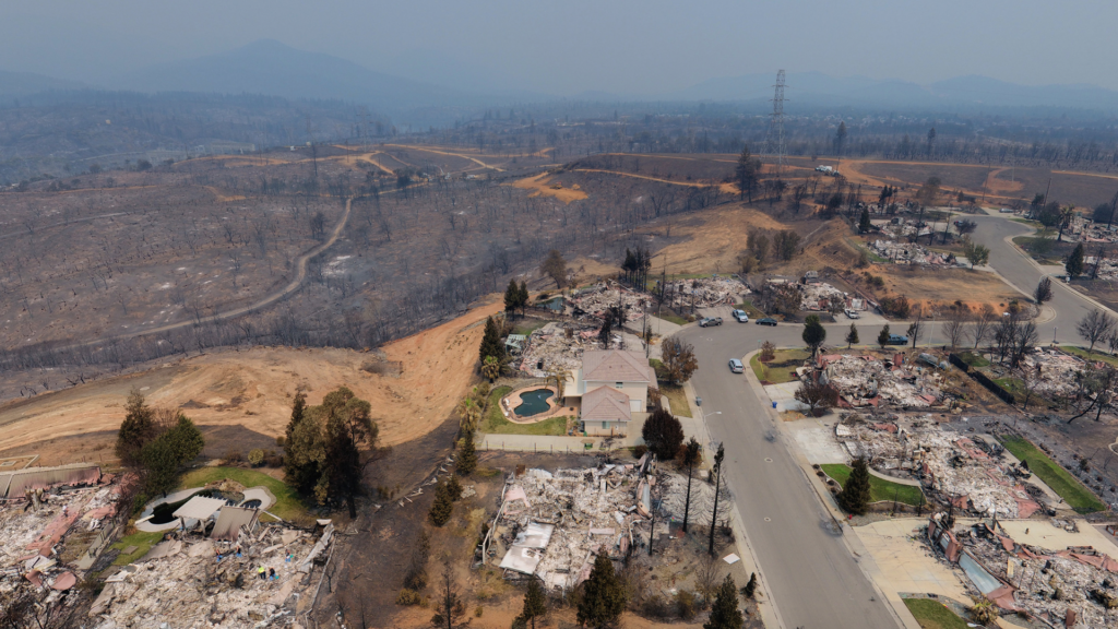 an aerial view of a neighborhood in the mountains