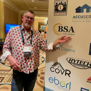 Viewing Of Verisk Elevate Conference 2022 2 brian bradley with bsa signage elevate 2022
