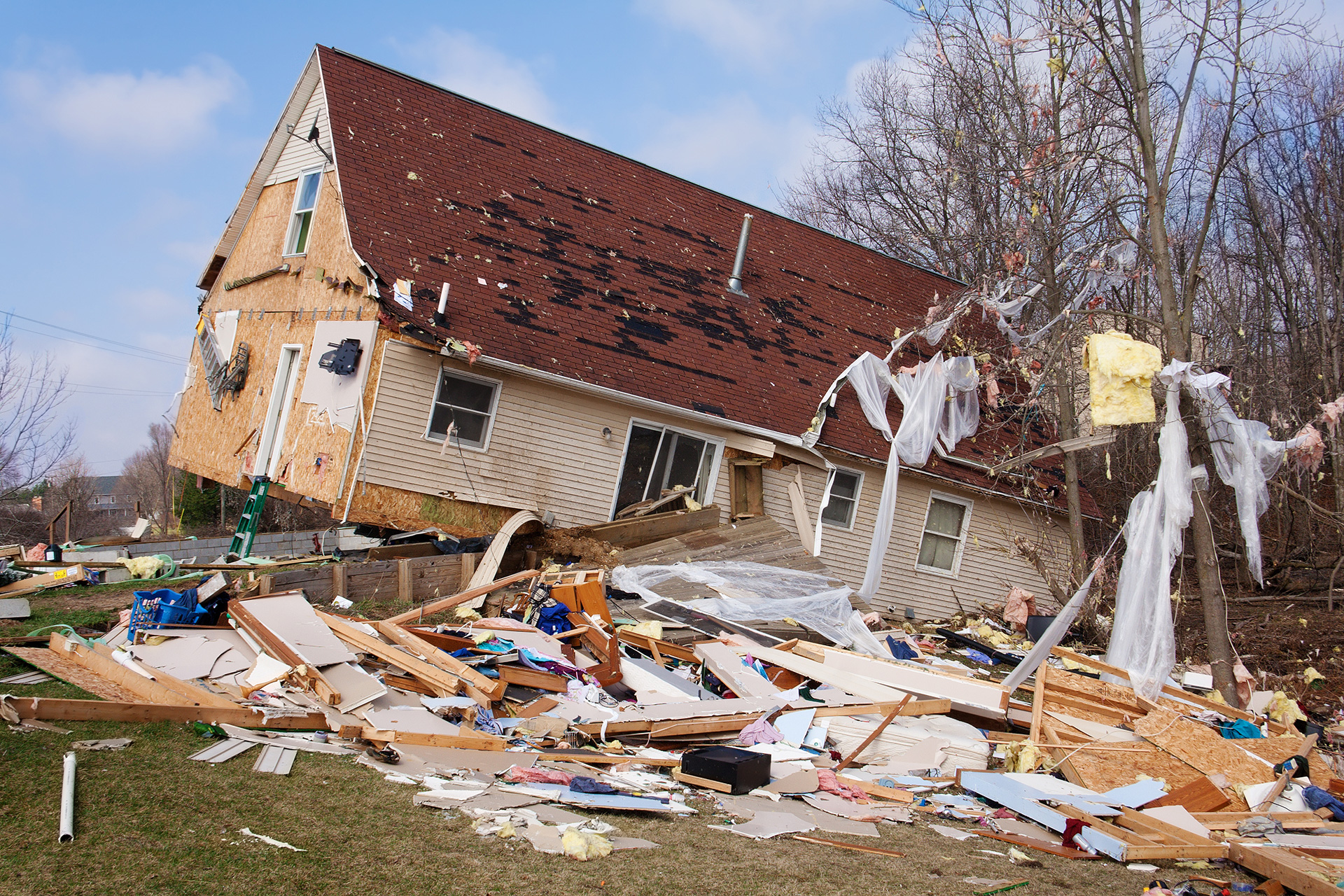 a house that has been torn down and is in the process of being demolished