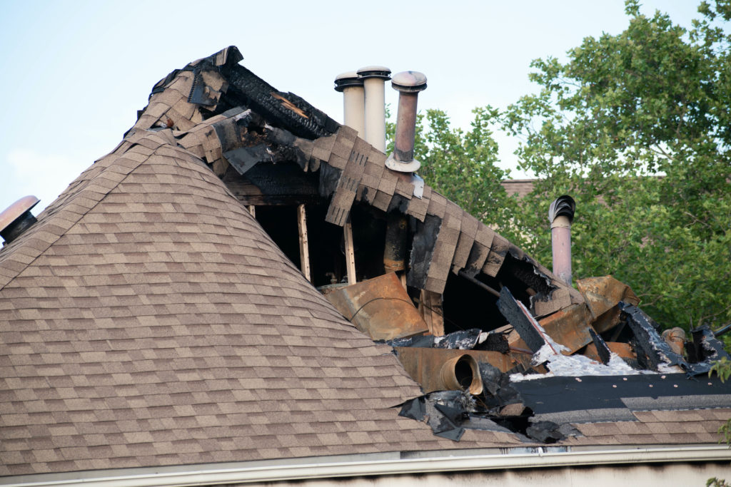 the roof of a house that has been gutted