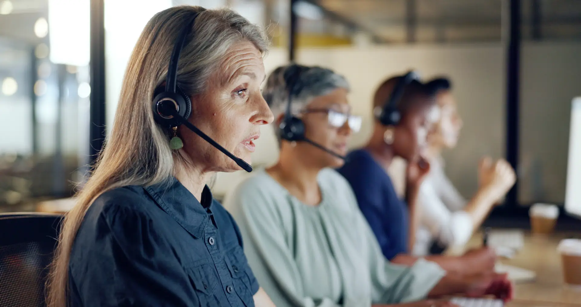 call center agents with headsets providing customer support